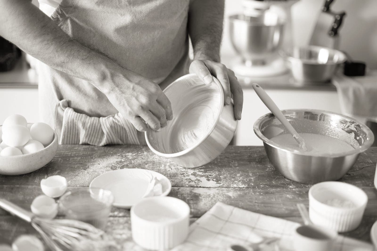 Round cake pans stacked on a counter