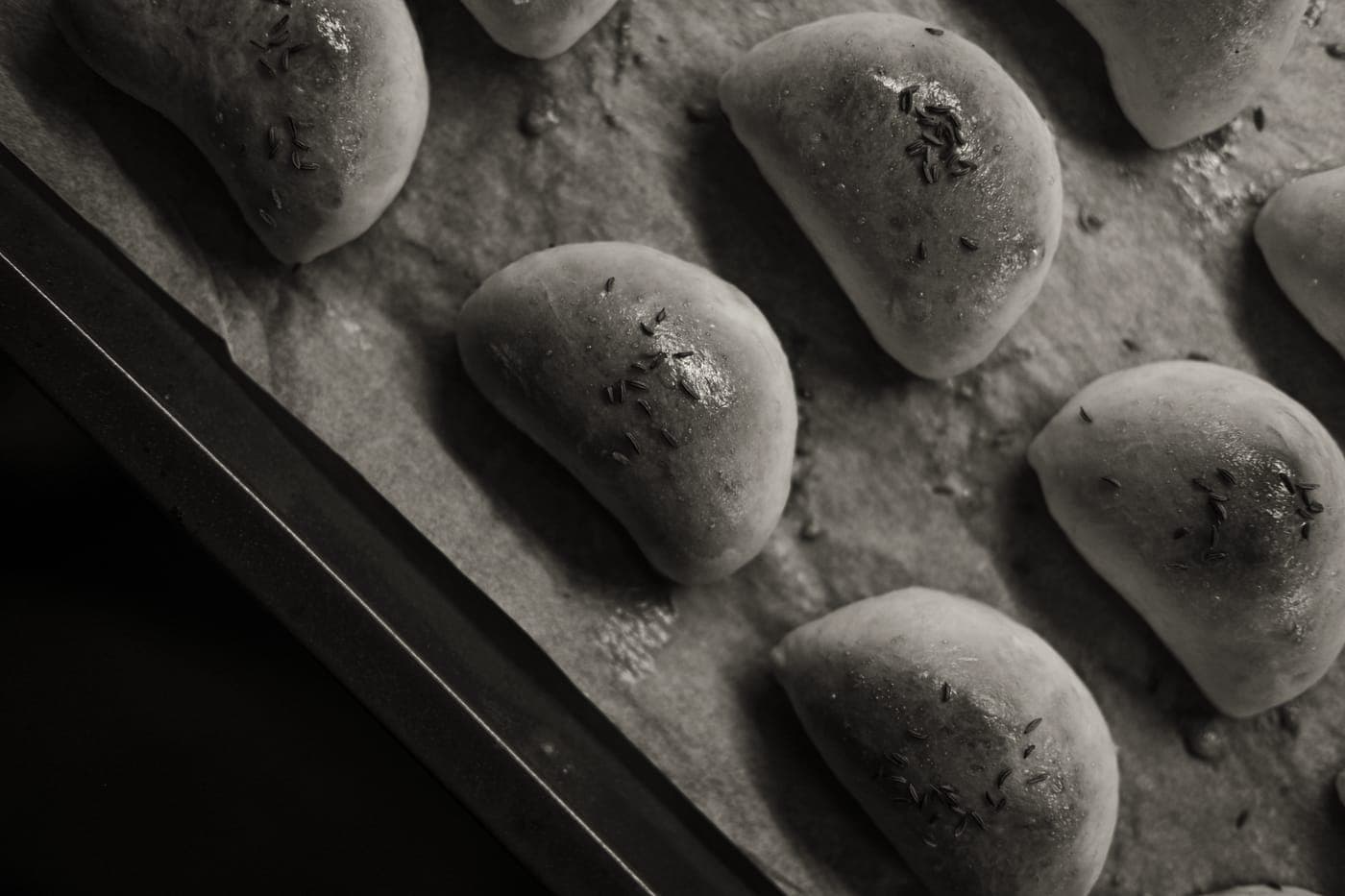 The surface texture of a metal baking tray, close up