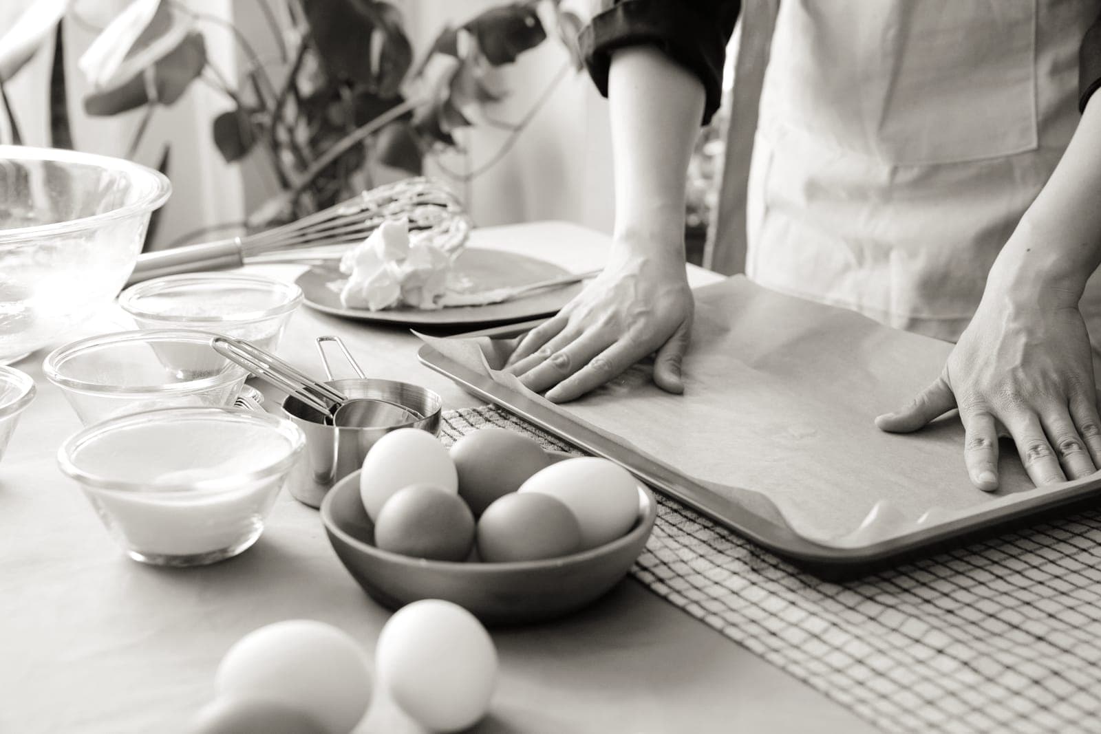 Parchment paper lining a baking tray
