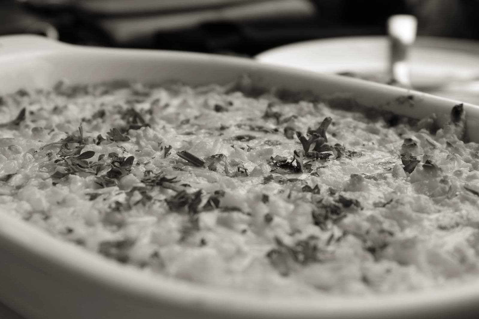 A ceramic baking dish holding baked food