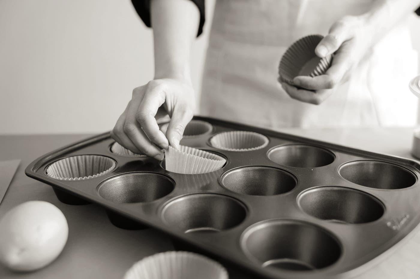 A loaf tin and muffin tray in a home kitchen