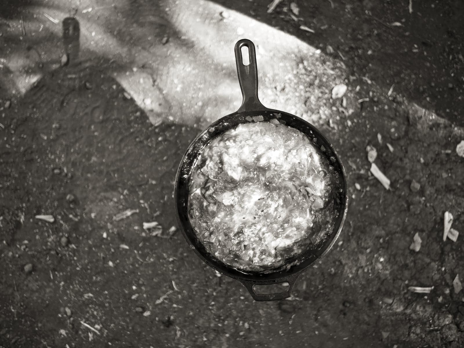 An old cast iron skillet with a worn surface