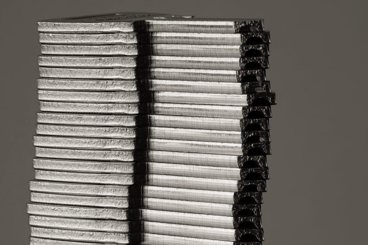 Close-up of the layered edge of a piece of clad cookware