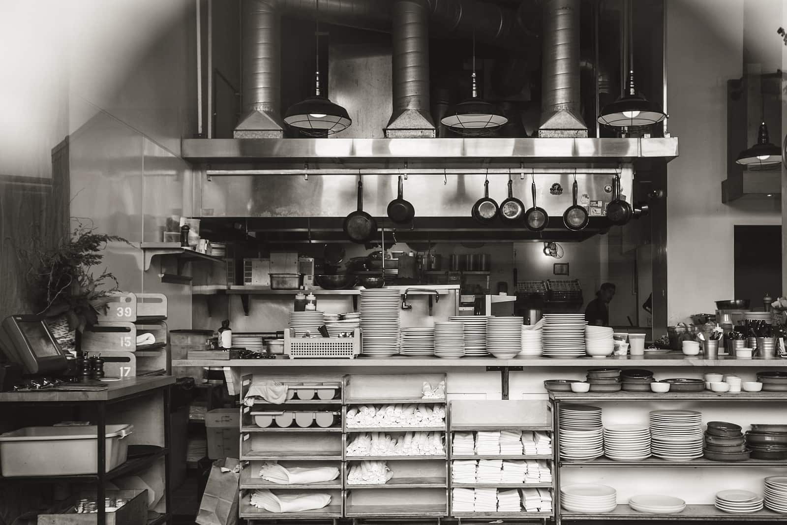 A stack of old worn pots and pans