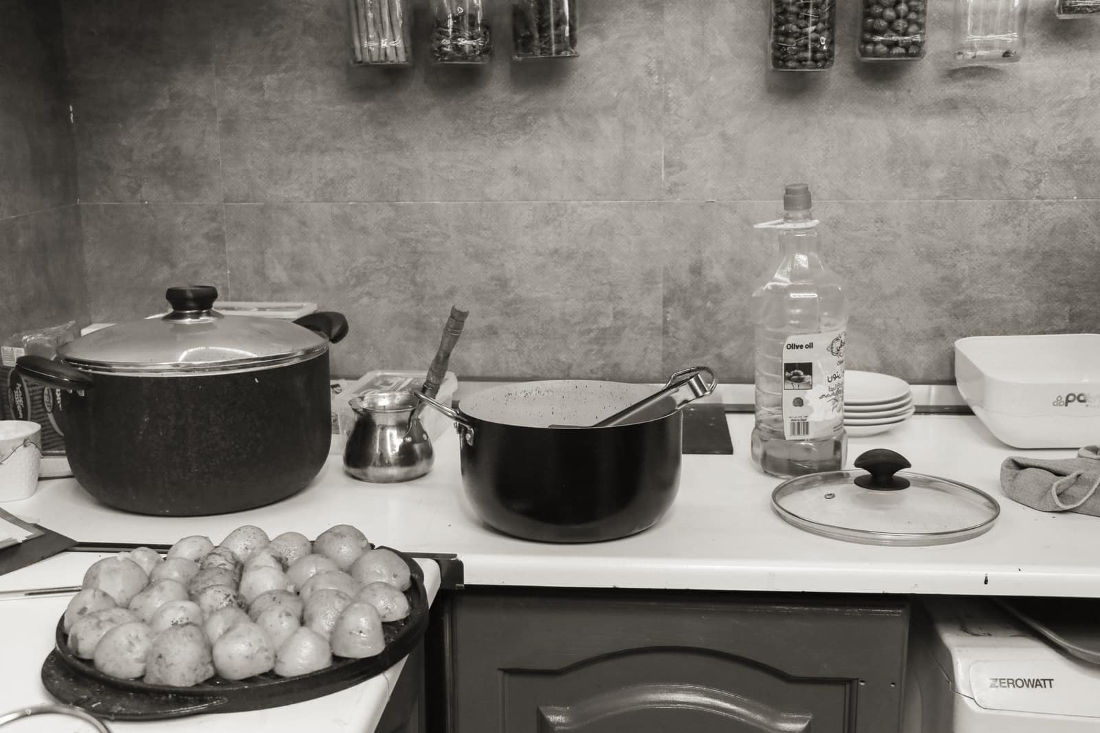 New pots and pans set out as a gift on a kitchen counter