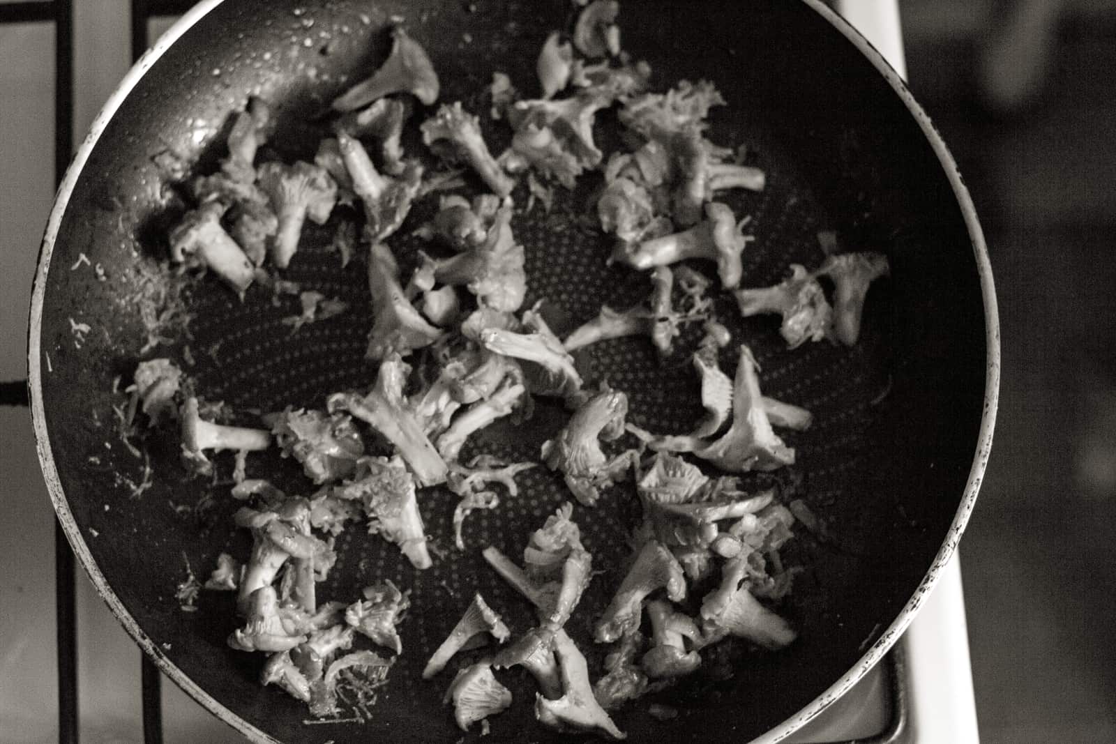 A worn frying pan with a scratched surface