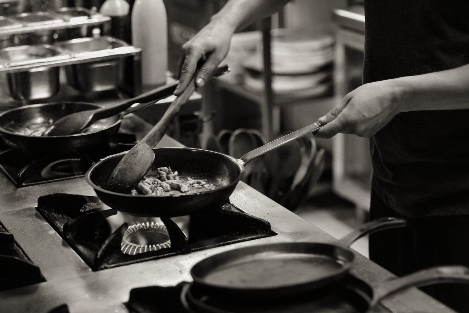 Stacked pans in a commercial restaurant kitchen