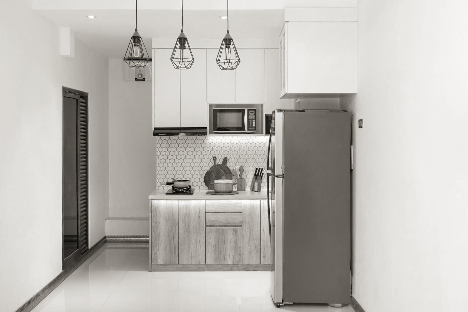A compact apartment kitchen counter with limited storage