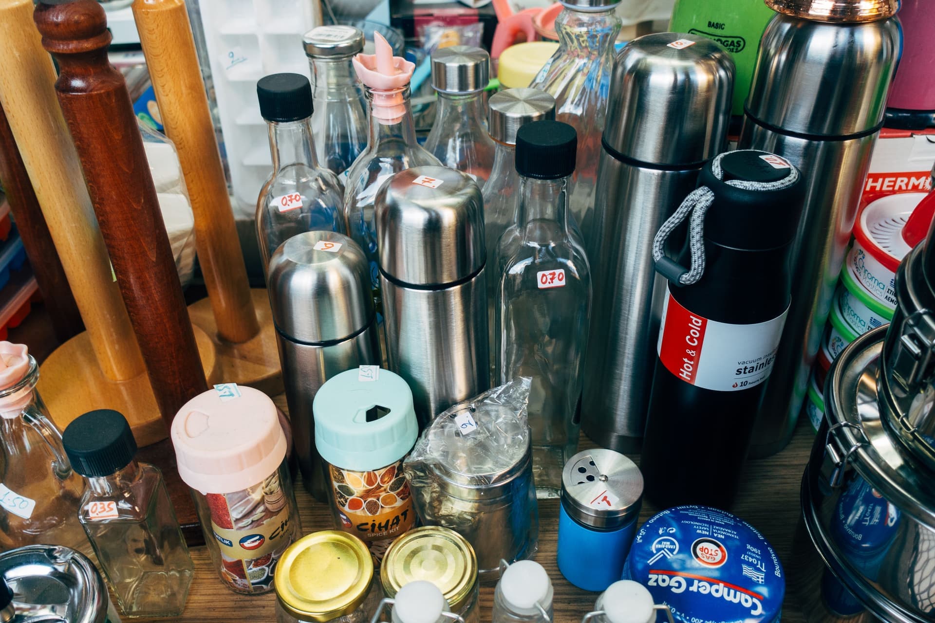 An assortment of kitchen containers and gadgets crowded together
