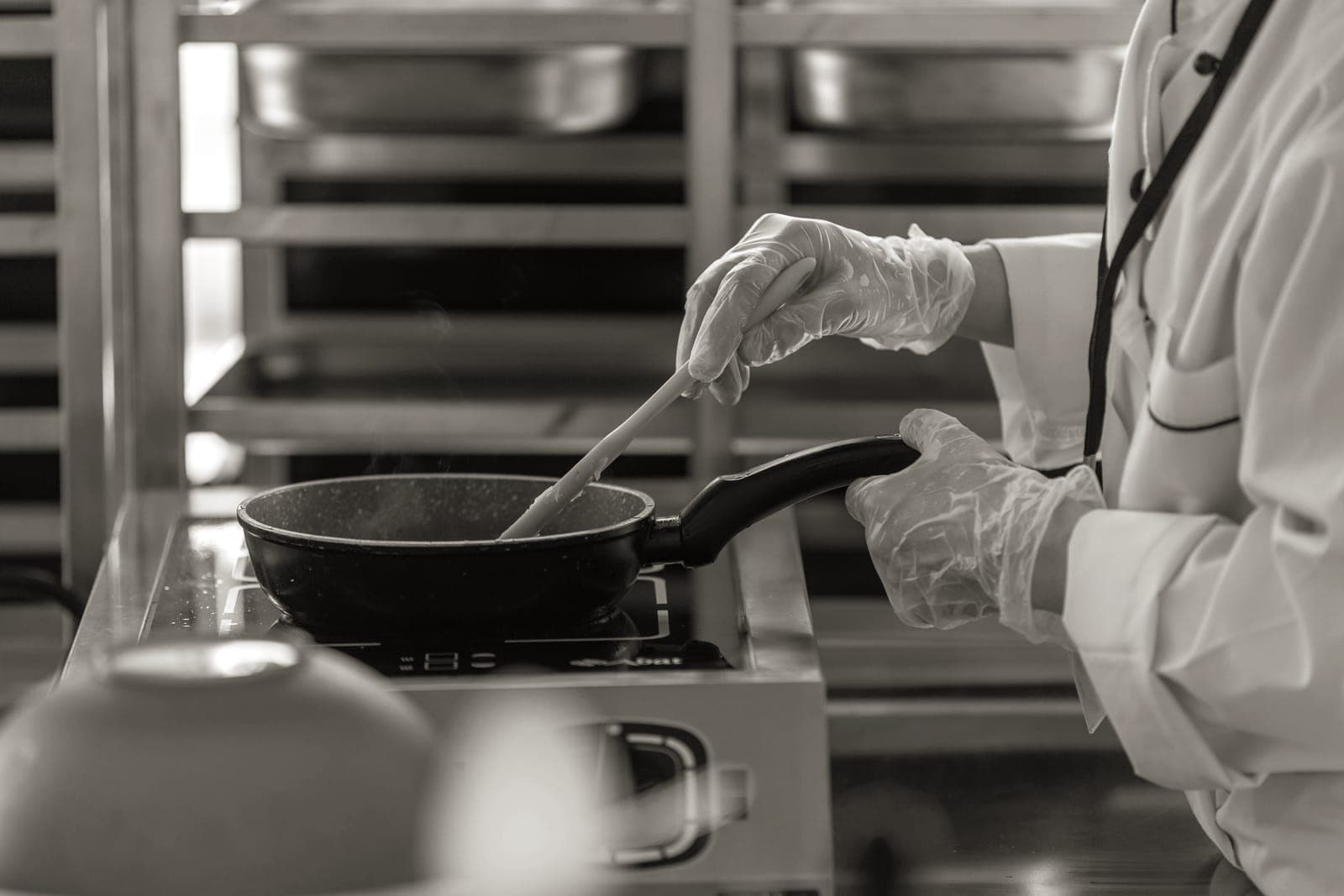 A white ceramic coated frying pan