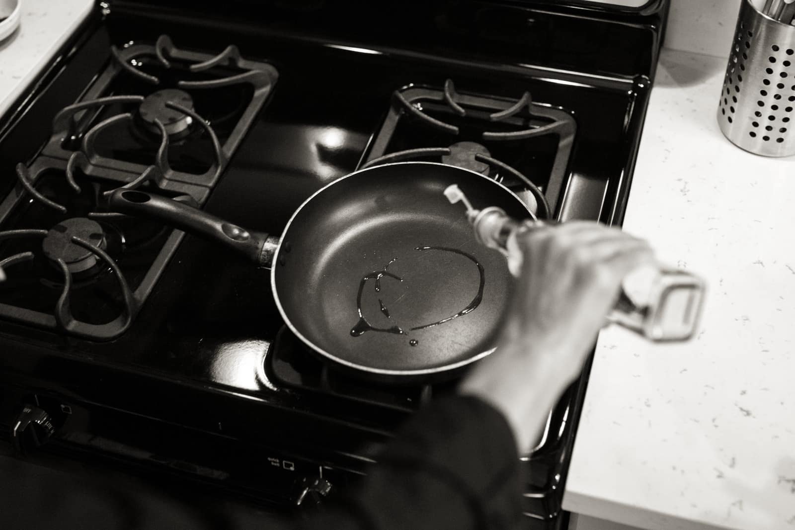 A worn and scratched nonstick frying pan surface