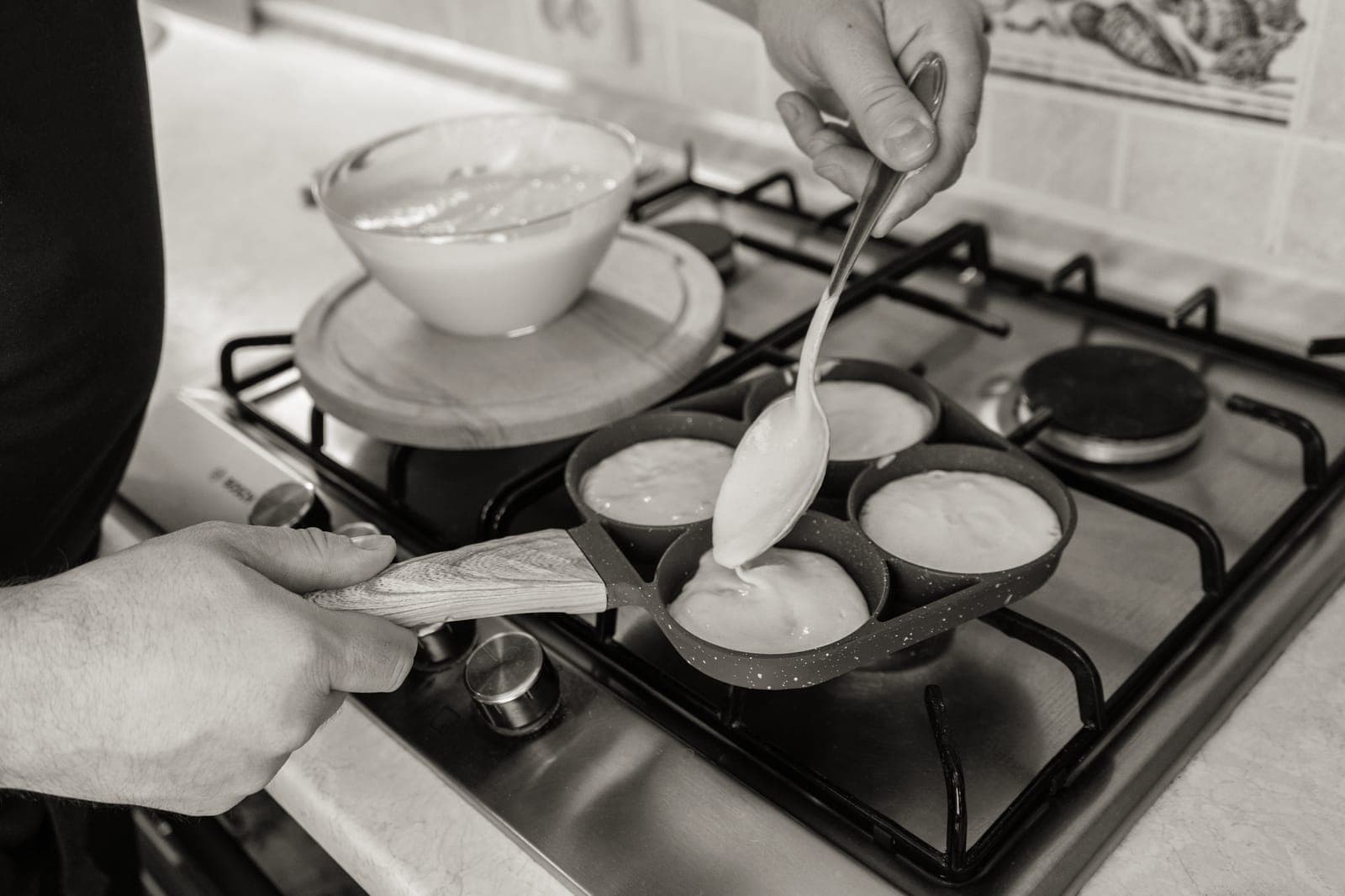 A speckled gray nonstick frying pan