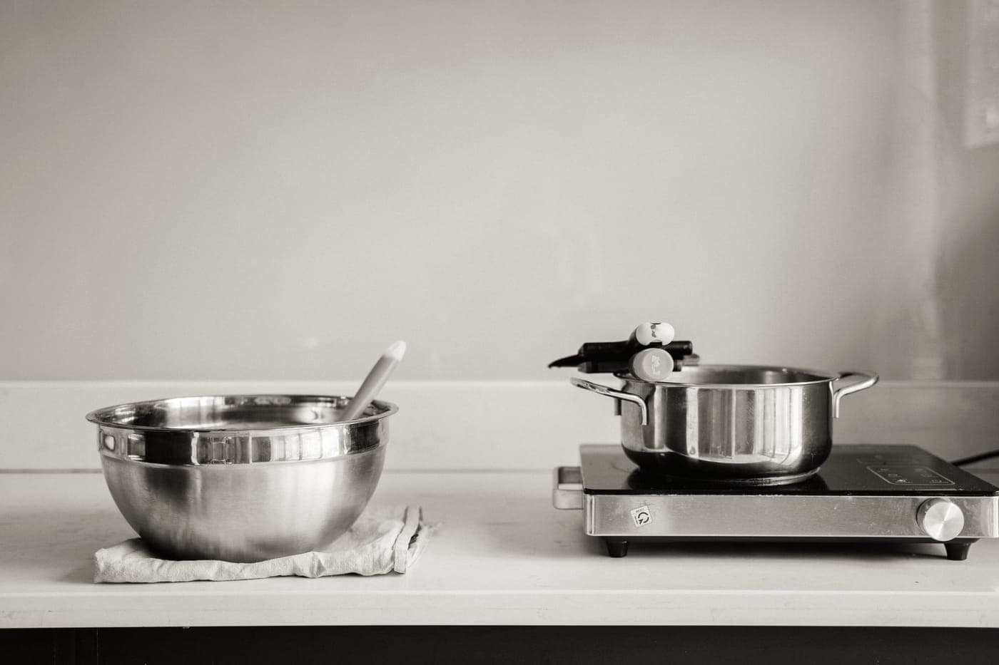 Stacked stainless steel saucepans