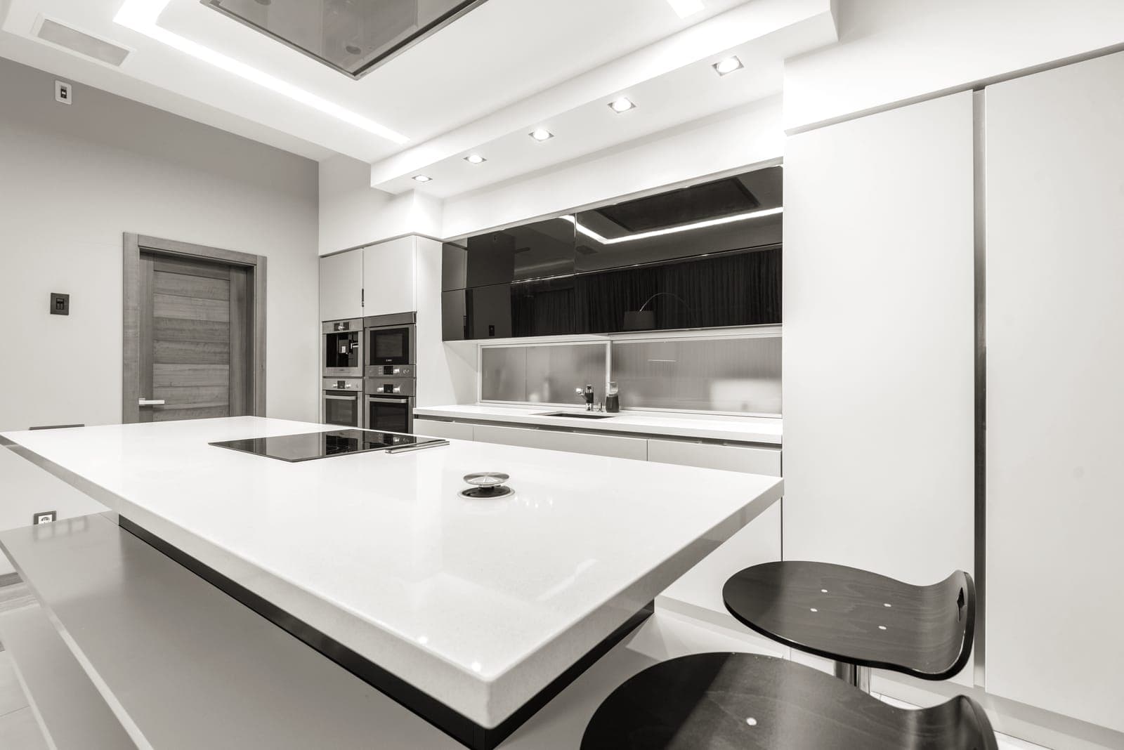 A saucepan heating on a modern cooktop
