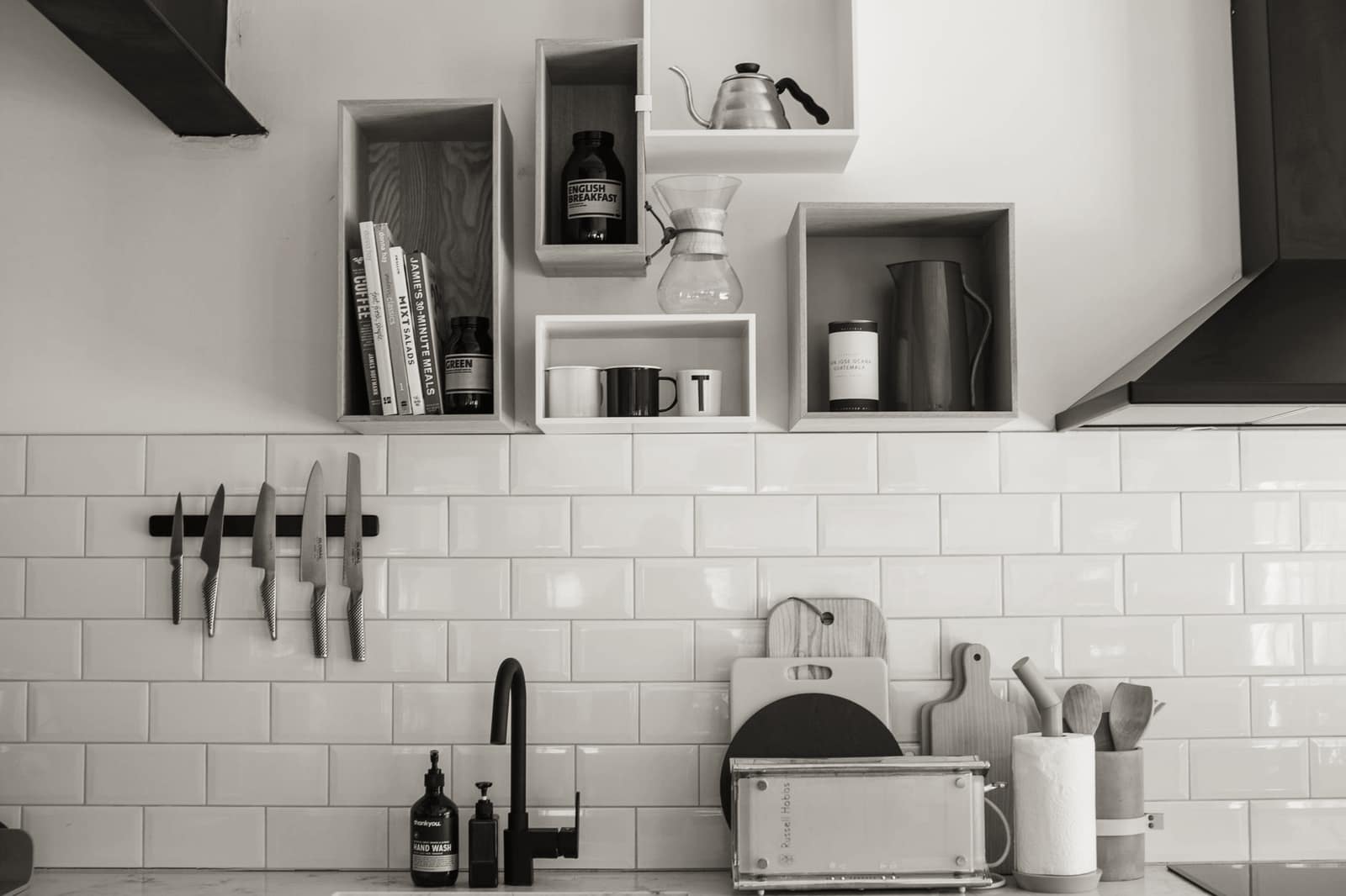 A boxed cookware set on a kitchen counter