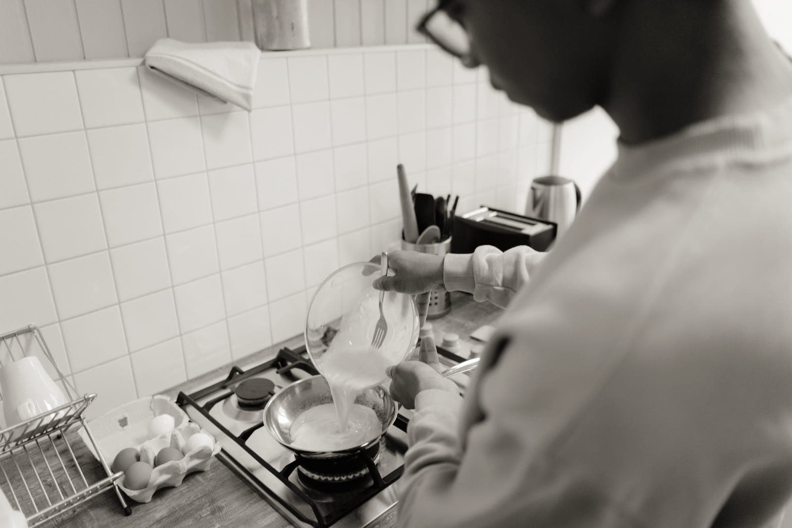 Saucepans of different sizes on a stovetop