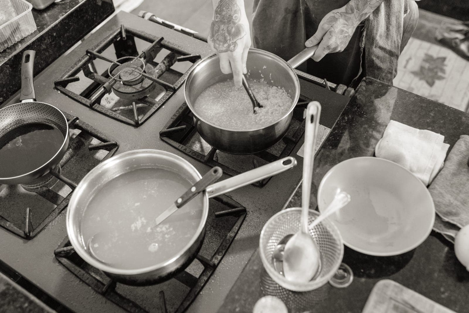 A large stockpot of soup on a stove